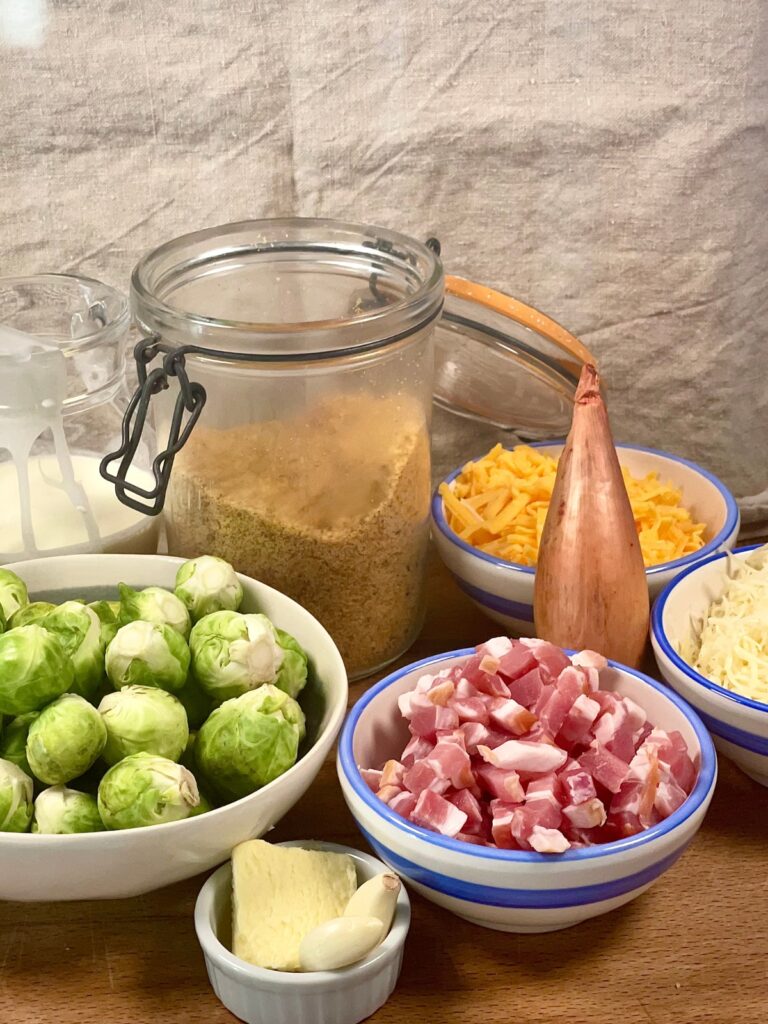 Layout of cheesy Brussels sprouts casserole ingredients