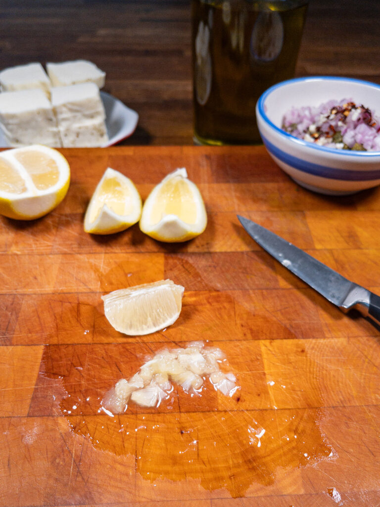 Keto lemon and herb sauce ingredients being prepared