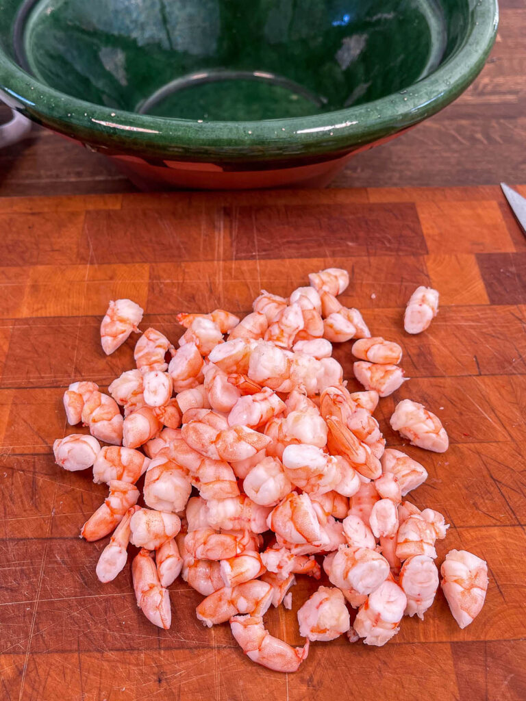 Shrimp on cutting board for keto shrimp salad