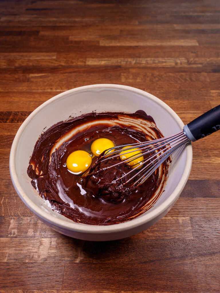 Ingredients for ketogenic brownies being mixed in a bowl