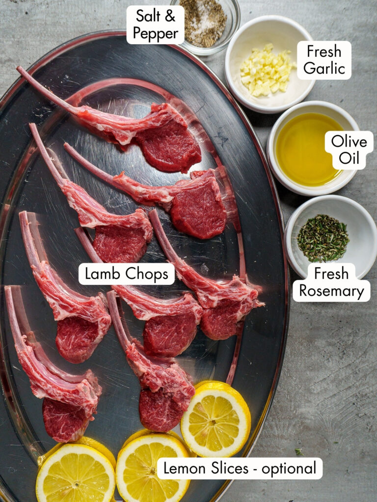 Lamb chop recipe ingredients including lemon, lamb chops, rosemary, salt, pepper, fresh garlic and olive oil placed on a silver platter with text descriptions
