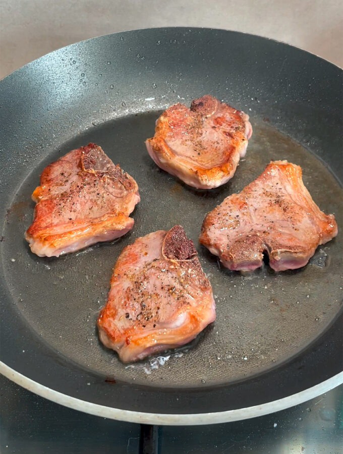 Step 2: Cook for 1 minute and flip the chops.