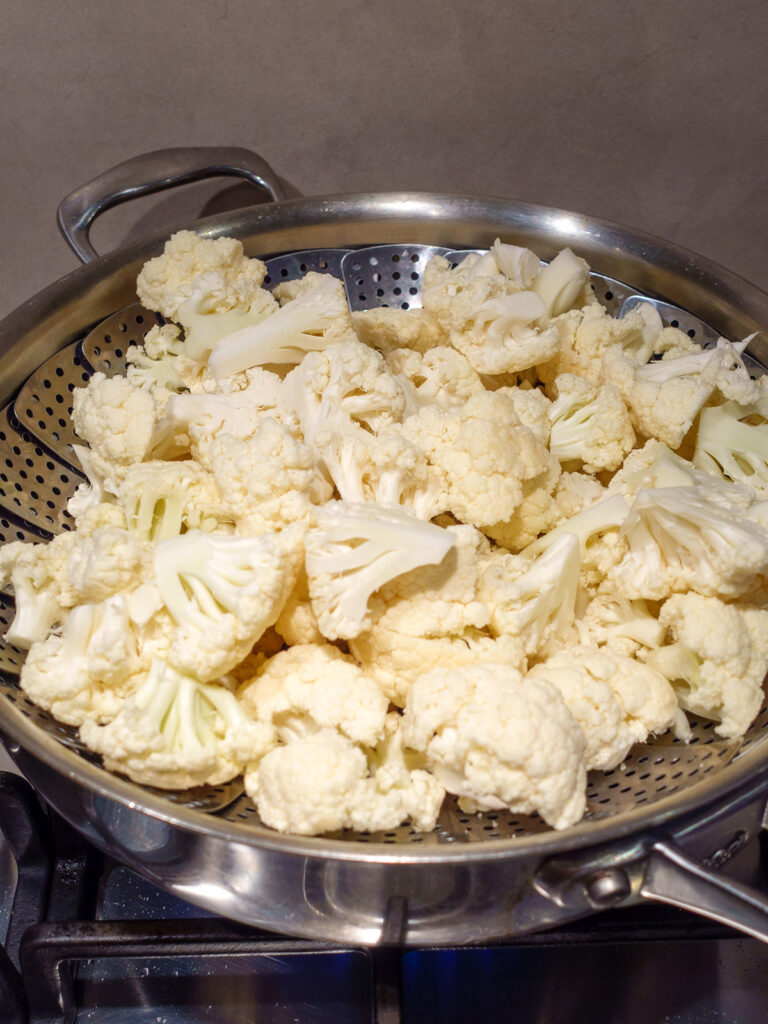 cauliflower-florets-being-steamed