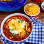 Keto-chili-con-carne-served-in-a-bowl-placed-on-a-blue-and-white-checked-cloth