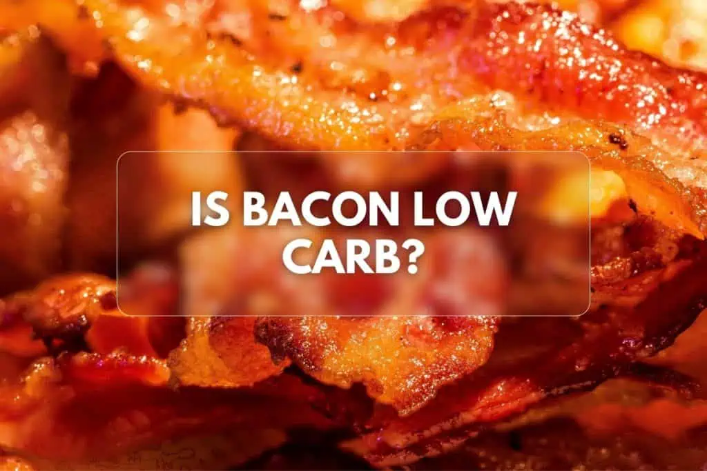 Close-up of crispy bacon strips with a golden brown color, the text "Is Bacon Low Carb?" is overlayed in white.